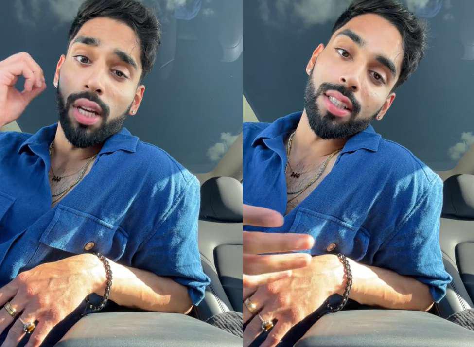 Prayag Mishra talking to camera while filming TikTok video