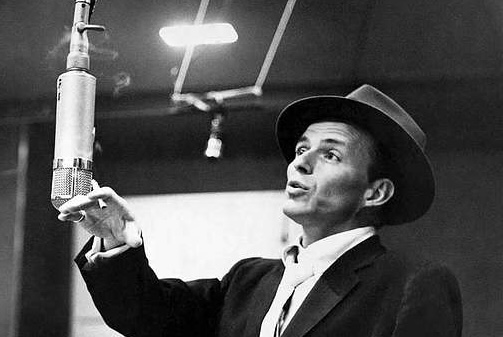 Publicity photo of Frank Sinatra recording at Capitol Studios.