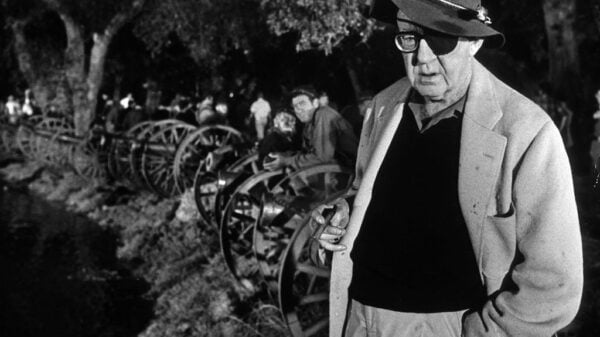 Director John Ford holding cigar and wearing the eye patch he needed late in life, on set of Civil War scene, the Battle of Shiloh, fr. his film "How the West Was Won."