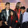 Members of the Jackson family, including his children Paris, Prince Michael Jr and Blanket on stage at the 'Michael Forever' Michael Jackson tribute concert at the Millennium Stadium on October 08, 2011 in Cardiff, Wales.