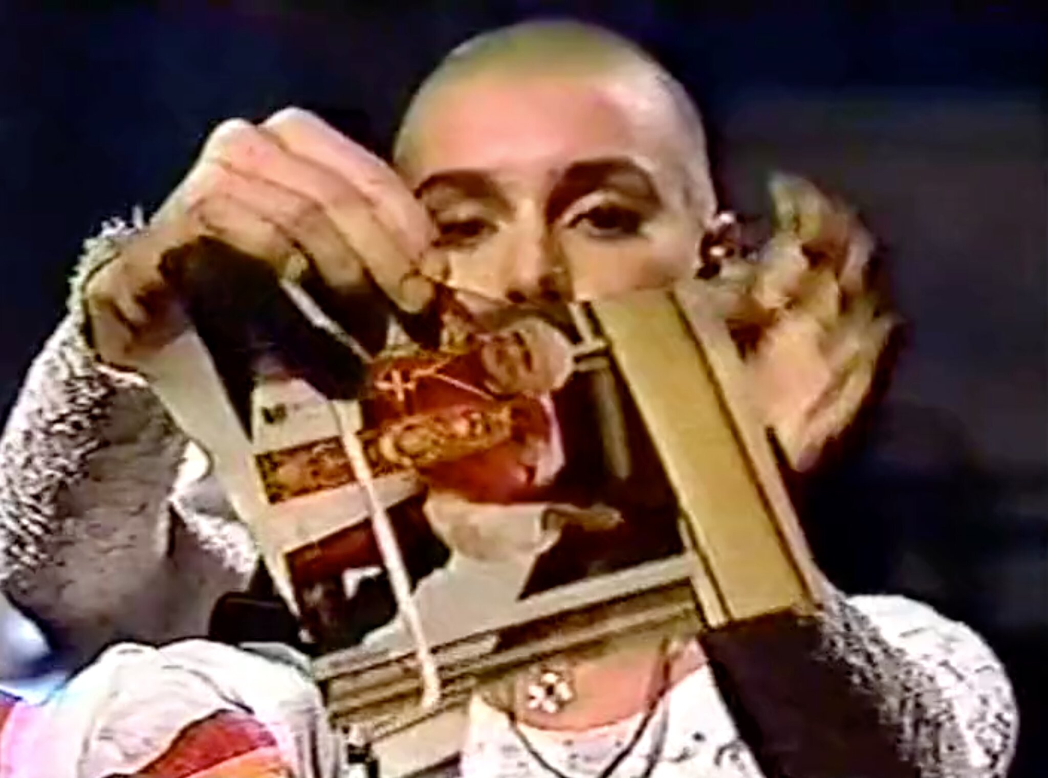 Sinead O'Connor ripping the photo of the Pope