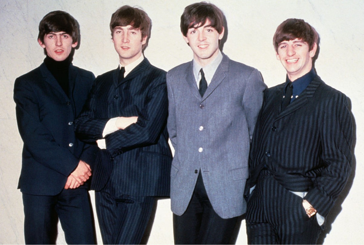 The Beatles pose together in 1965. From left to right: musicians George Harrison, John Lennon, Paul McCartney and Ringo Starr