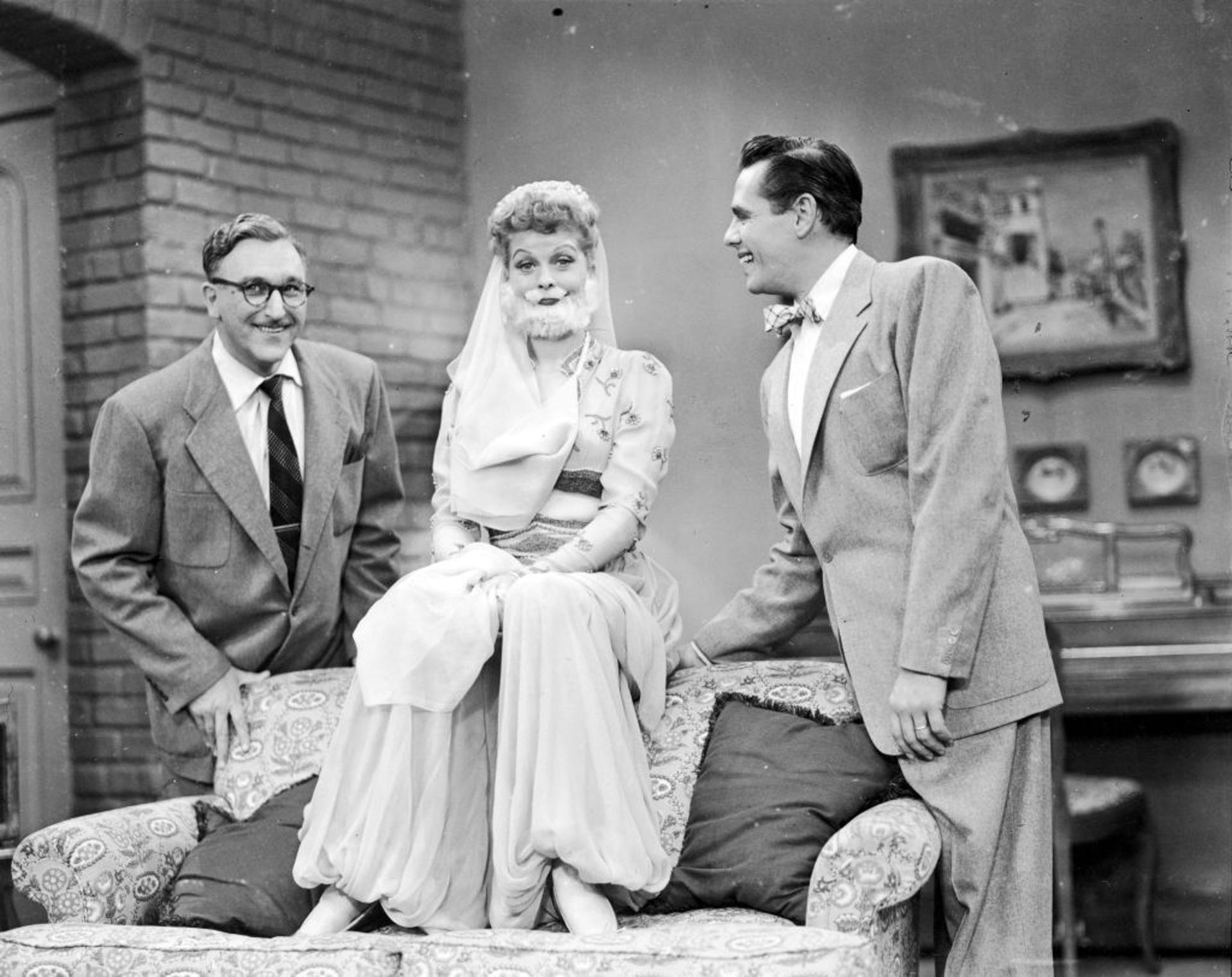 Lucille Ball pictured with a fake moustache during an episode of the sitcom “I Love Lucy”